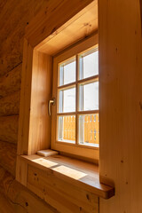 Wooden window detail with de-focus background. Inside view