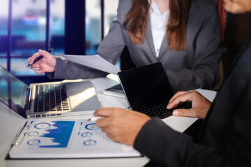 Brainstorming process at sunny office.Young coworkers work together modern office.Business team meeting,work