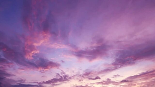 Pastel purple pink clouds in sunrise or sunset blue sky