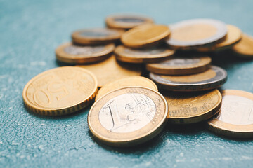 Golden coins on dark background, closeup