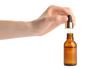 Female hand with bottle of healthy essential oil on white background