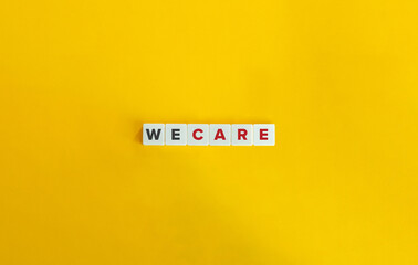 We Care Text on Letter Block Tiles. Banner and Conceptual Image.
