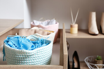 Drawer with wardrobe organizers in dressing room, closeup