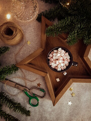 christmas still life with tray, cup of cocoa with marshmallow 