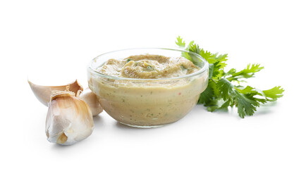 Bowl with tasty baba ghanoush, garlic and parsley on white background