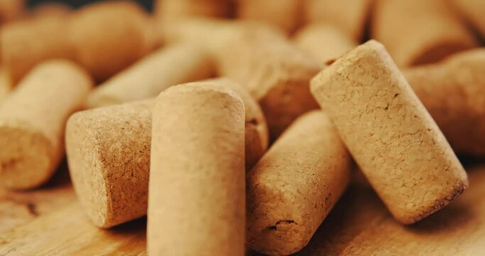 Wine corks on an old vintage wooden board.