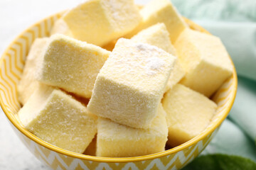 Bowl with tasty sweet marshmallows on light background? closeup