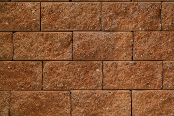 Closeup the red brick wall is a square next to each other