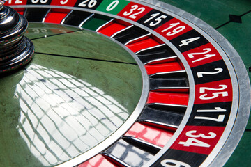 Casino roulette wheel. Close-up.