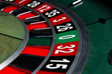 Casino roulette wheel. Close-up.
