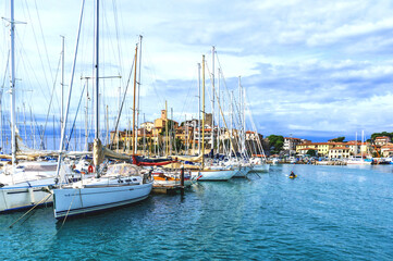 Fototapeta premium Bodrum,Turkey. 24 August 2017:Sunset sea yachts in yacht port Bodrum. Yachting sunset scene. Sunset yachts view.Yalikavak Bodrum Marina, sailing boats and yachts in Bodrum