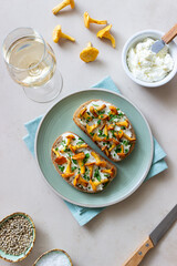 Bruschetta with mushrooms chanterelles and white cheese. Healthy eating. Vegetarian food.