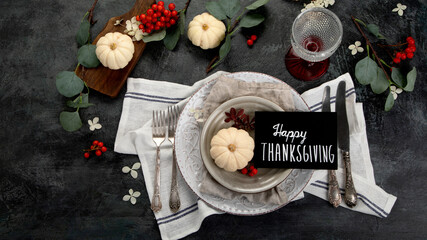 Harvest table setting on dark background.