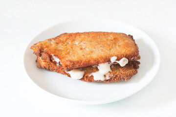 tenderloin booklets stuffed with ham and cheese (libritos spanish food)
