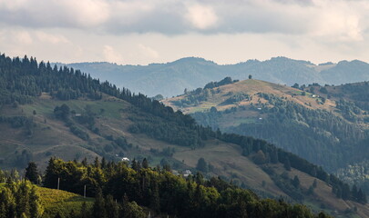 mountain slopes in the Ukrainian Carpathians. mountain tops and forests on a background of blue sky