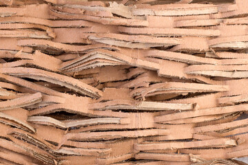 Abstract background from pieces of torn cardboard