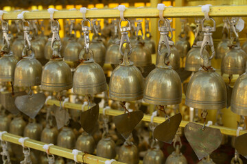 Fototapeta na wymiar Small golden bell in a Thai temple