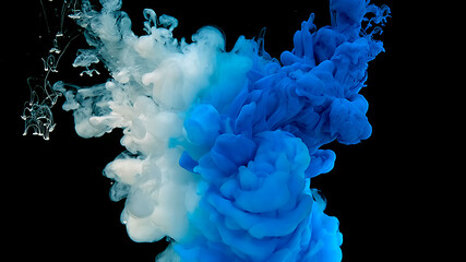 Waves and drops of blue and white paints. Beautiful abstract background. Blue cloud of ink. Cosmic magic background.