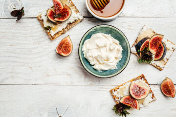 Bowl of cream cheese. Philadelphia cheese crackers. Healthy snack. banner, menu, recipe place for text, top view