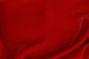 Dark red fabric texture background, detail of silk or linen pattern.