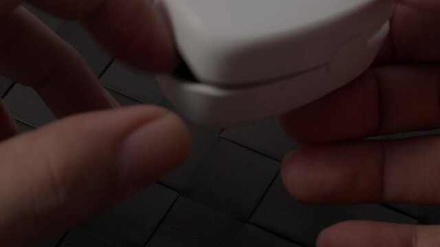 Oximeter usage. Finger pulse oximeter used to measure pulse rate and oxygen levels. Home self care during Covid 19 pandemic. healthcare monitoring concept. using portable fingertip pulse oximeter. 4k