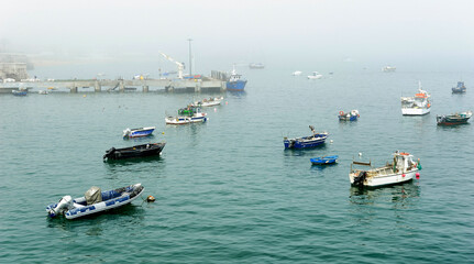 Fototapeta na wymiar fog at the fishing port at Cascais, Portugal