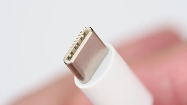 Close up of USB type C connector system or connection interface isolated on white background. Transfer information or charge for digital camera, gadget, smartphone, Hard Drive, harddisk or laptop.
