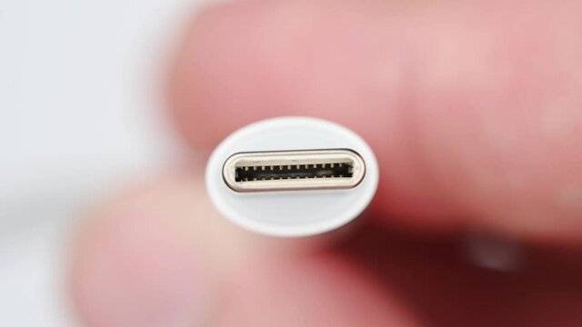 Close up of USB type C connector system or connection interface isolated on white background. Transfer information or charge for digital camera, gadget, smartphone, Hard Drive, harddisk or laptop.
