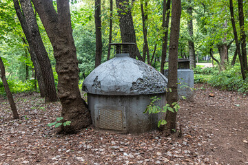 An old closed sewer well in the city park