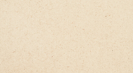 Fototapeta premium Brown paper texture background from a paper box packaging. Paper cardboard background concept