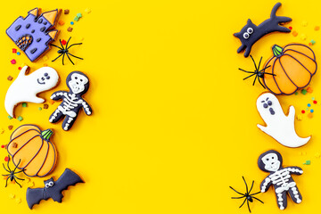 Funny Halloween party cookies with spiders flat lay top view