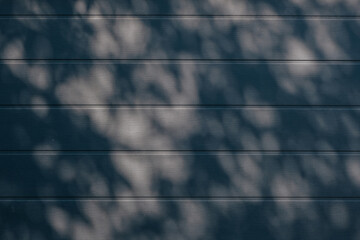Shadow patterns on the wall. Background, texture.