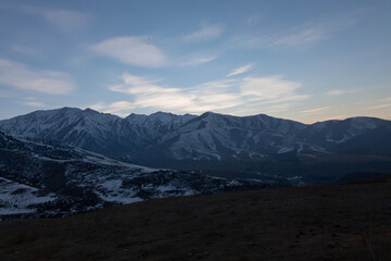Mountain roads of the Tien Shan highlands, at sunset
