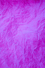 Crumpled vintage Purple paper textured obsolete background.