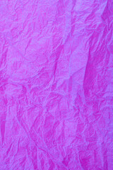 Crumpled vintage Purple paper textured obsolete background.