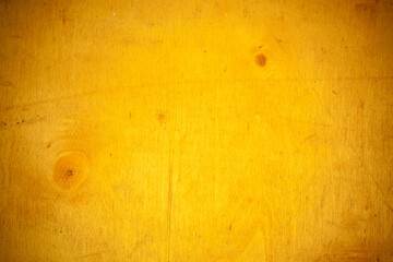 Yellow wooden board background.