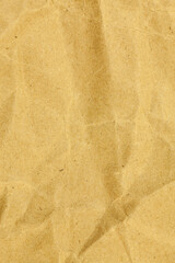 Yellow paper crumpled texture background.