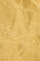 Yellow paper crumpled texture background.