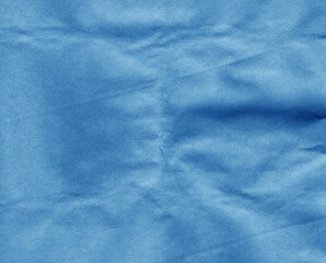 Crafted crumpled paper for background and desing in navy blue tone.