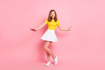 Full length photo of young attractive girl happy positive smile wear casual outfit summer isolated over pink color background