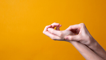 woman holds her hand - pain concept