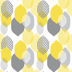 Autumn leaf fall. Seamless modern pattern with abstract leaves for textiles and paper products. The trend colors of 2021 are yellow and gray. 