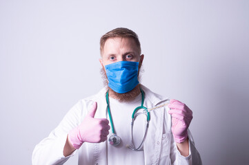 bearded doctor with a thermometer in his hands