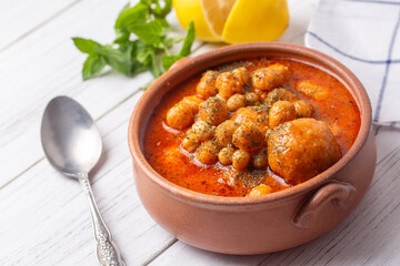 Traditional delicious Turkish foods; Bulgur soup (Turkish name; Anali Kizli, icli kofte)