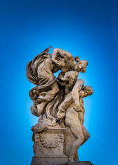 A famous kissing sculpture in front of the Altare della Patria (Altar of the Fatherland)  monument in Piazza Venezia (Venice Square) in Rome, Italy