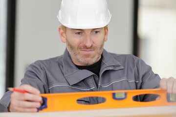 Fototapeta premium concentrated builder keeping special tool