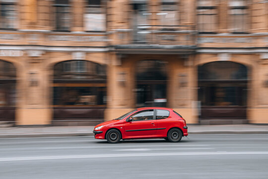 Ukraine, Kyiv - 2 June 2021: Red Peugeot 206 car moving on the street. Editorial