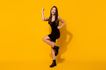 Full size photo of hooray brunette hairdo young lady hands fists wear black dress shoes isolated on...