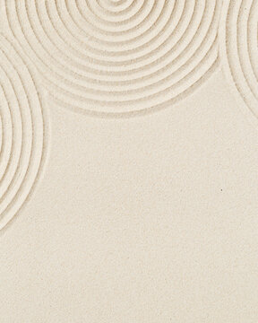Pattern in Japanese Zen Garden with concentric circles on sand for meditation and tranquility