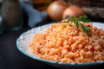 Traditional delicious Turkish food; rice pilaf with tomatoes (Turkish name; Domatesli pirinc pilavi)